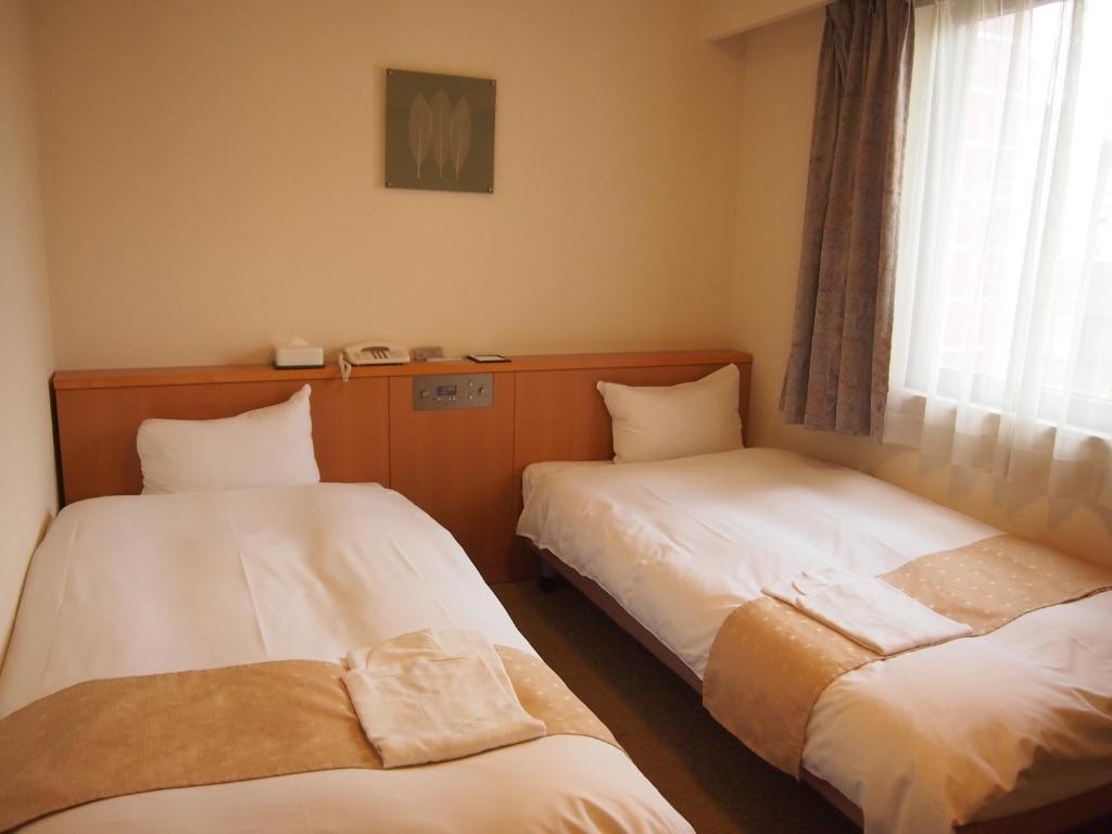 Nest Hotel Kumamoto Zimmer foto