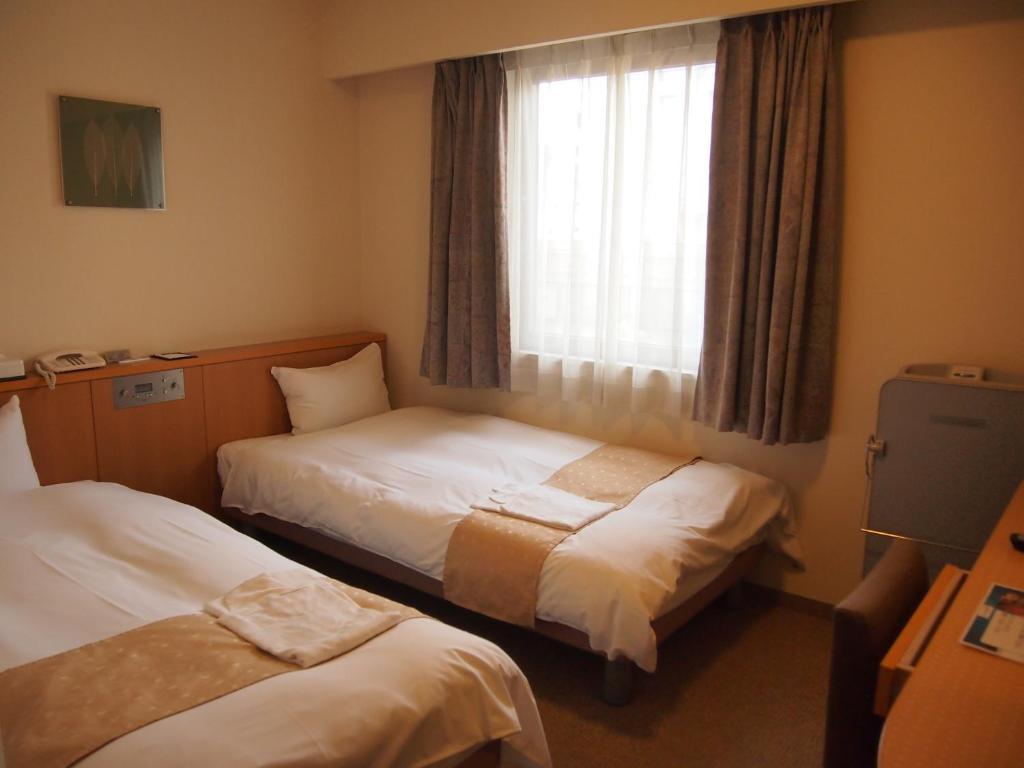 Nest Hotel Kumamoto Zimmer foto
