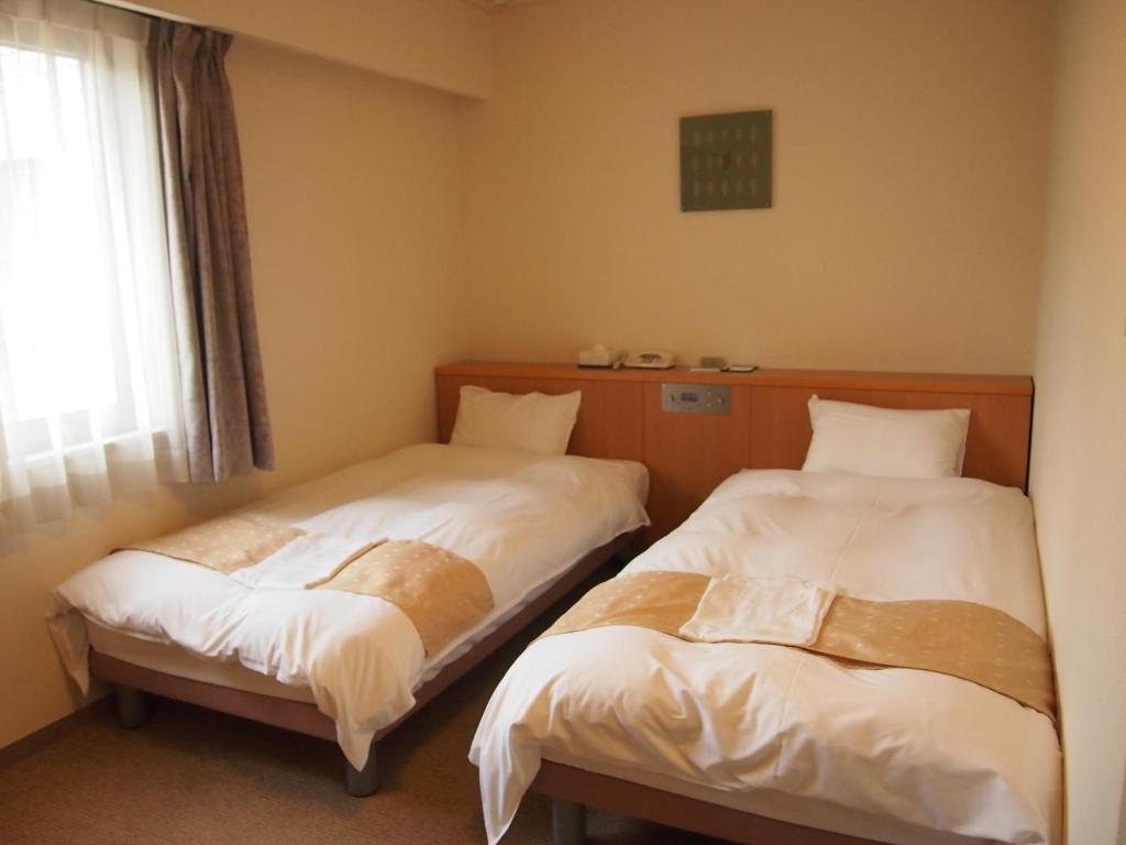 Nest Hotel Kumamoto Zimmer foto